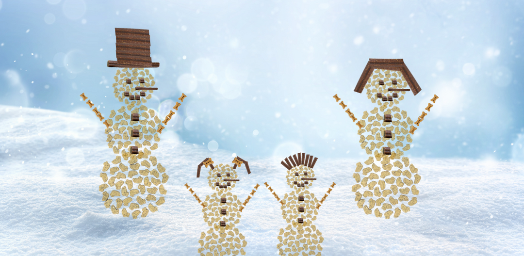 a snowman family made out of dog treats